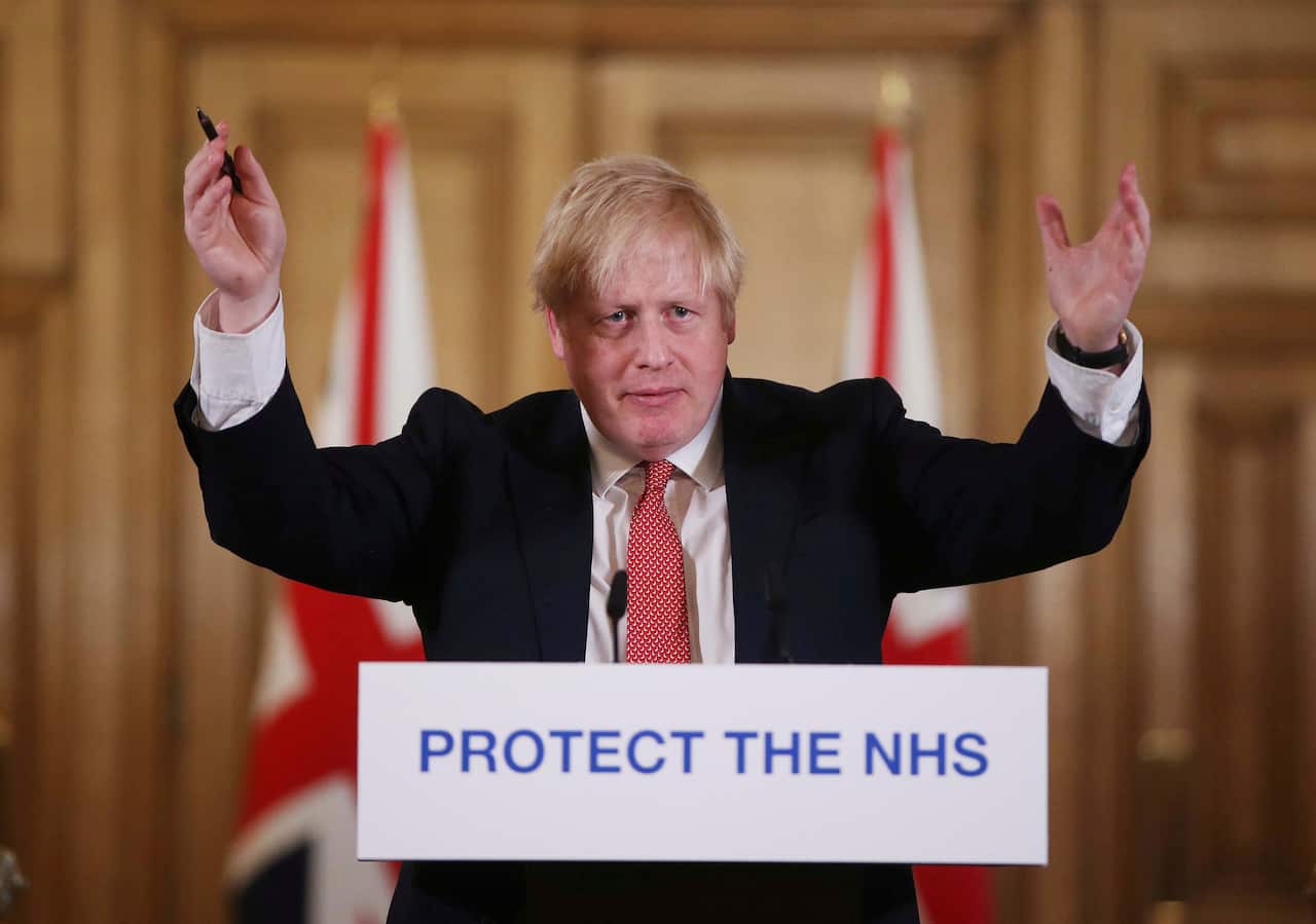 Boris Johnson speaking to reporters before he fell ill (Getty)