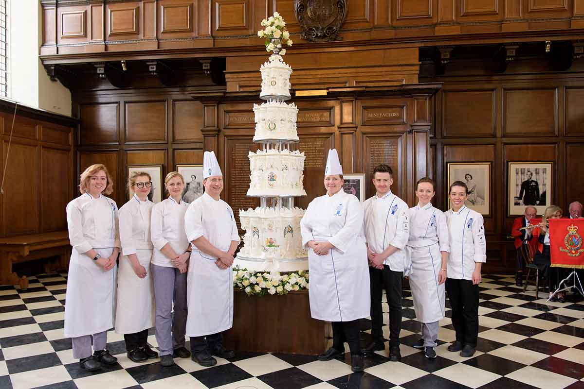 The chefs from Cordon Bleu with their cake