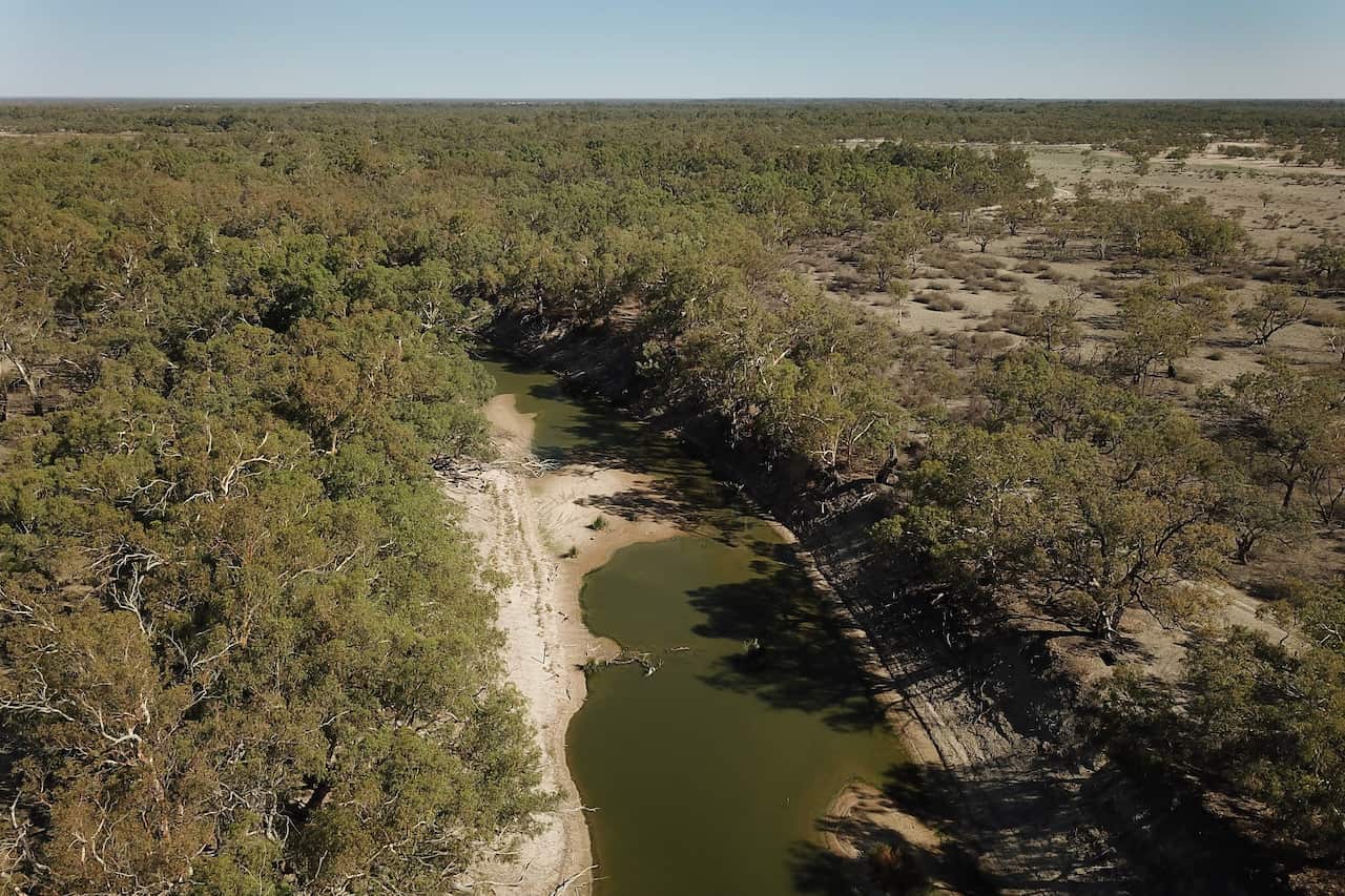 Diminishing water levels on the Darling River below weir 32 near Menindee, Wednesday, 13 February, 2019. 