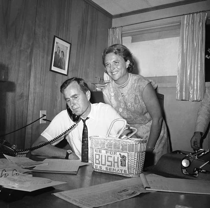 June 6, 1964: Barbara Bush with husband George at his headquarters in Houston.