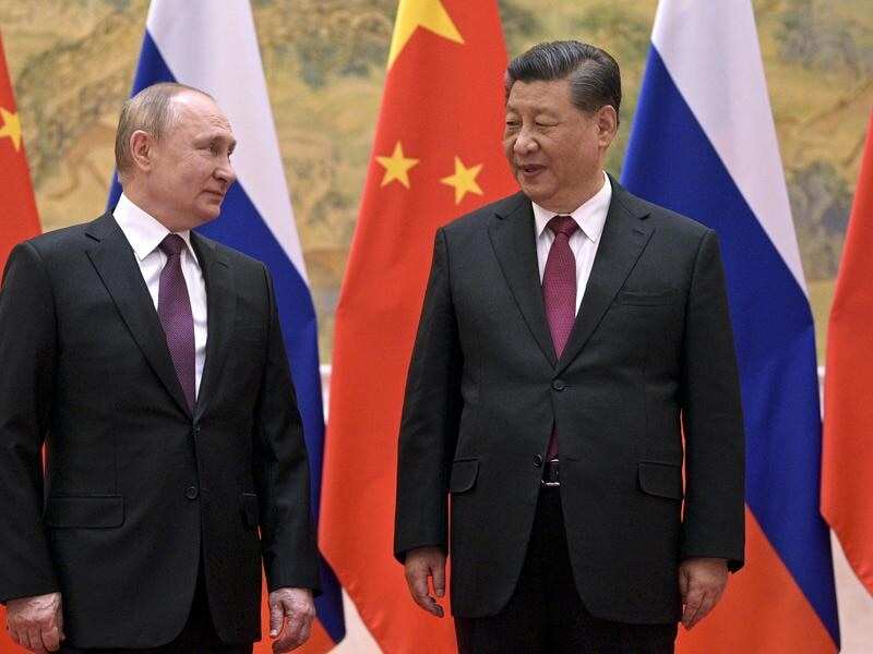 Vladimir Putin and Xi Jinping