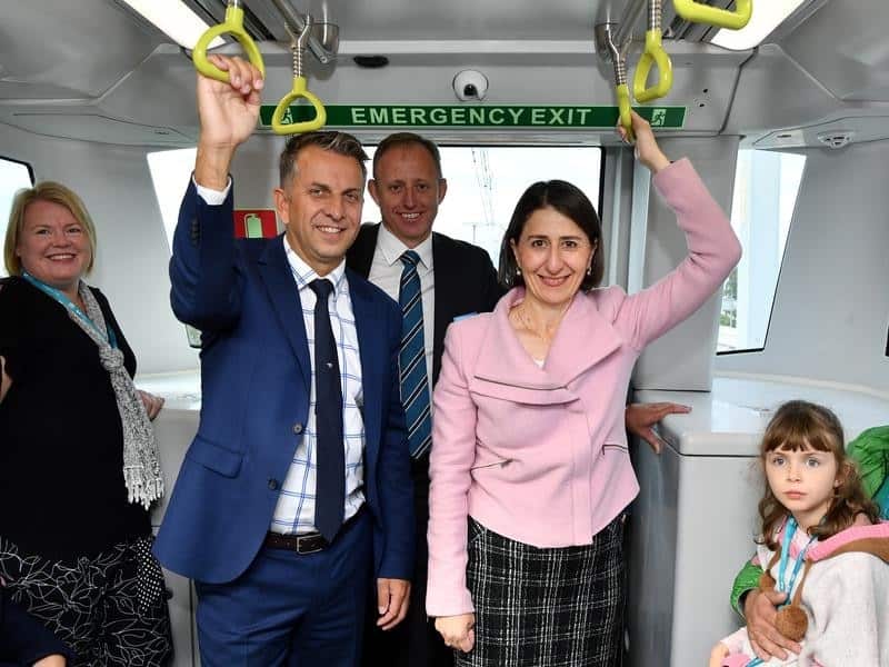 Andrew Constance and Gladys Berejiklian on the first Metro train trip.