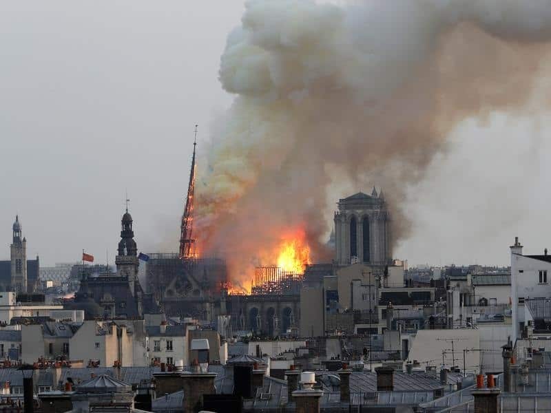 Flames are seen shooting out of the cathedral
