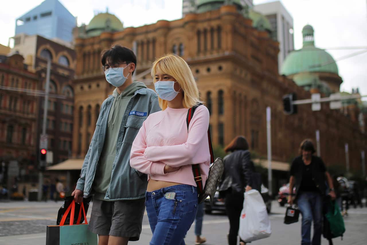 People wearing face masks as a preventative measure against coronavirus in Sydney