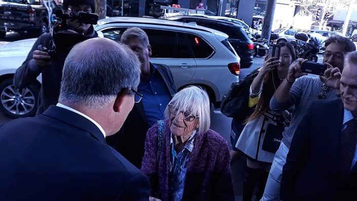 PM Scott Morrison, chatting with an elderly lady at the entrance of the Greek Centre. 