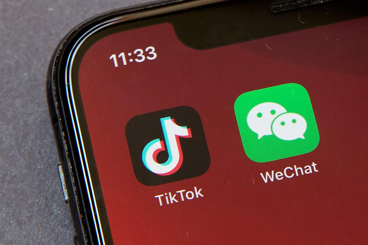 TikTok and WeChat on a smartphone screen