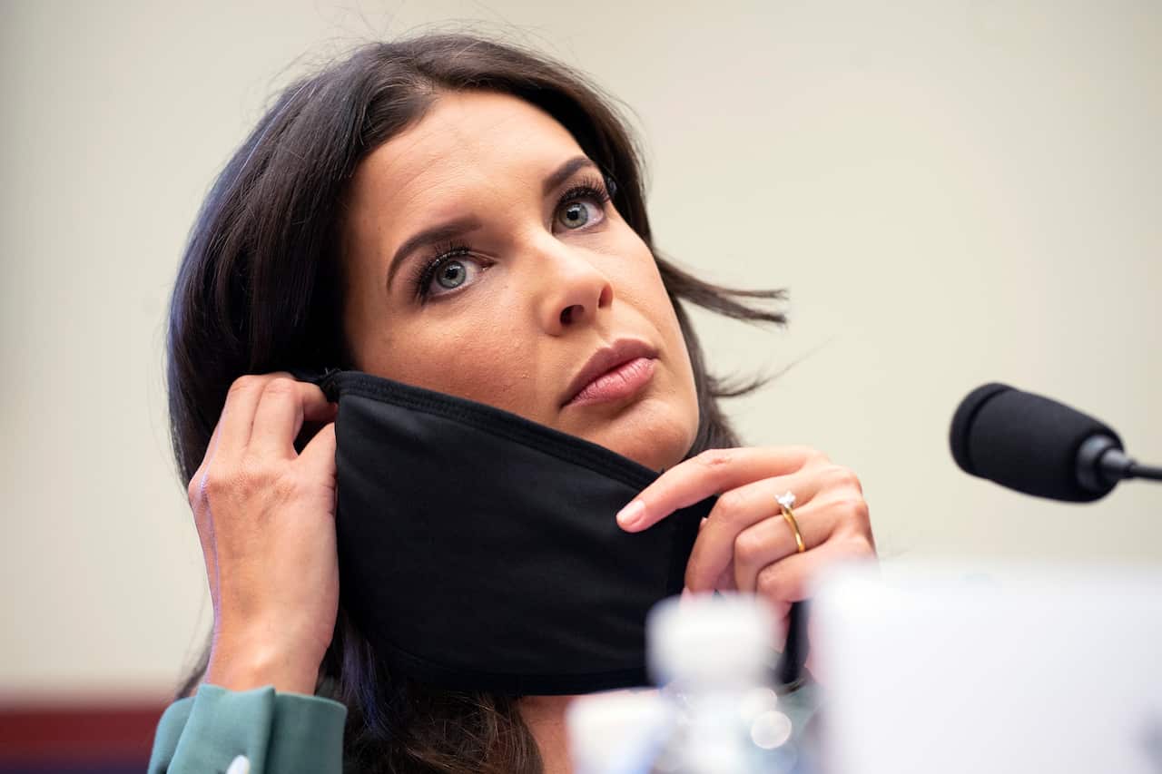Amelia Brace puts on a mask after making an opening statement during a House Natural Resources Committee hearing on Monday, 29 June, 2020