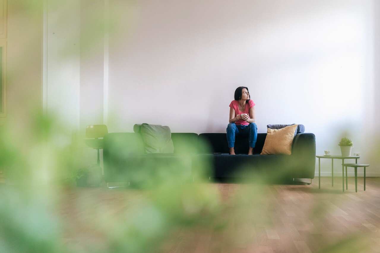 A woman sitting on a couch