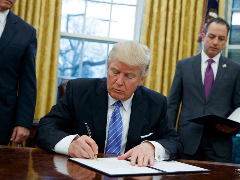 Donald Trump signs to withdraw from the TPP.