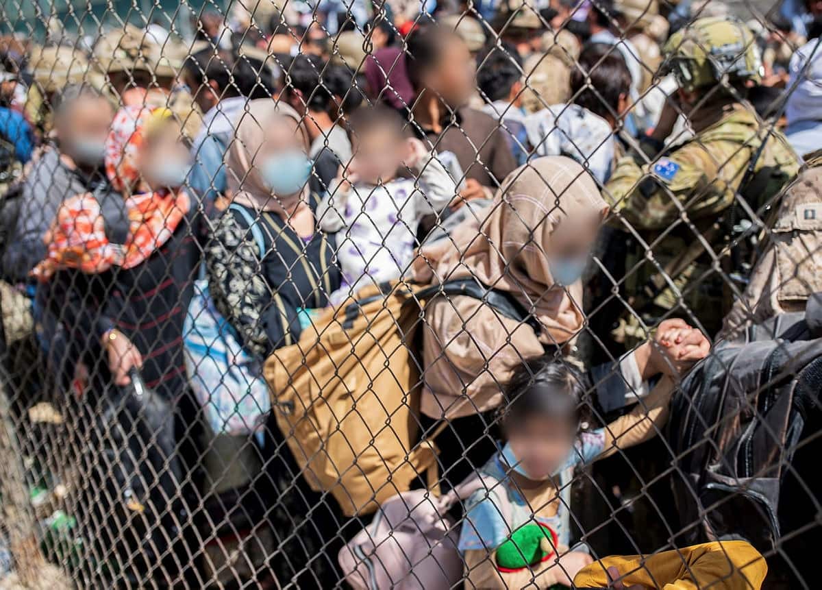 Afghan Australian visa holders try to enter the congested Abbey Gate at Hamid Karzai International Airport.