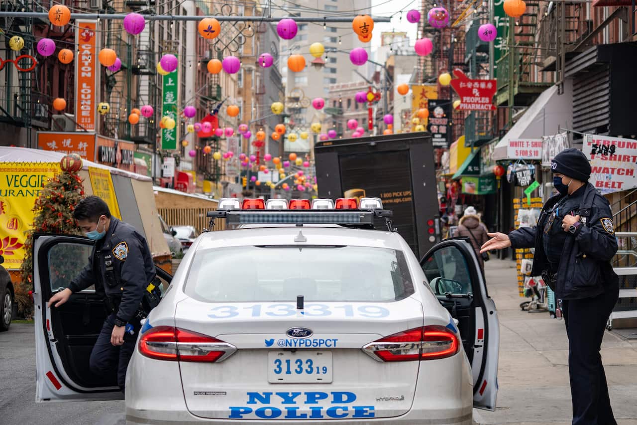 NYPD officers hand patrol Asian communities after mass shootings in Atlanta that left 8 dead, including 6 Asian Americans on 17 March 2021.