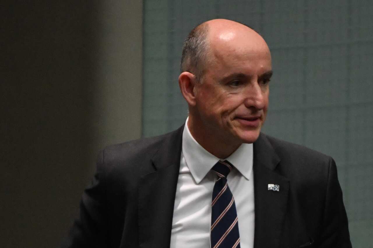 Minister for Government Services Stuart Robert leaves after Question Time in the House of Representatives at Parliament House in Canberra, Tuesday, December 1, 2020. (AAP Image/Mick Tsikas) NO ARCHIVING