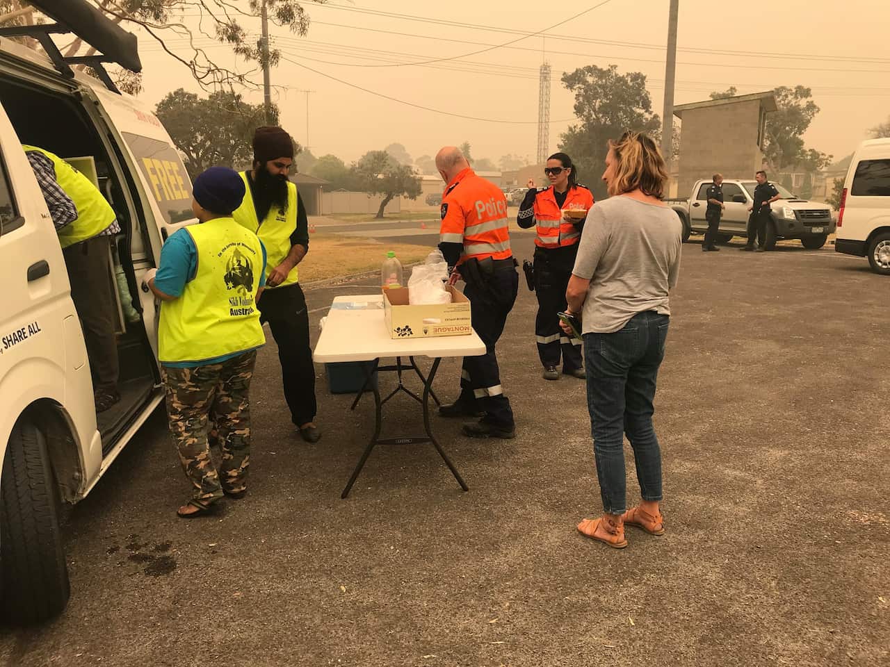 Sikh Volunteers Australia serving free food at Bairnsdale. 