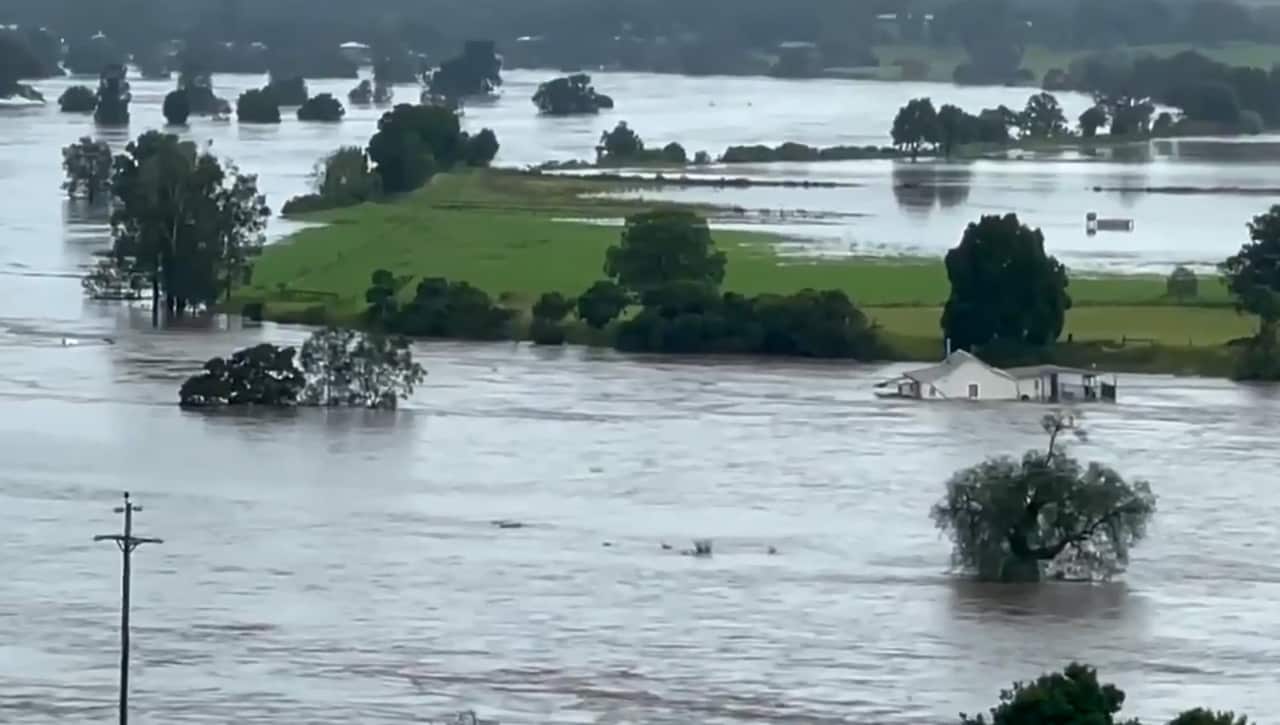 A house floating down the Manning River at Taree, NSW, 20 March, 2021.
