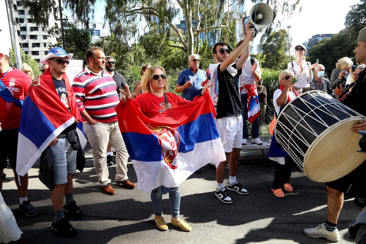 Protestors and fans of Serbia's Novak Djokovic outside the Park Hotel.                     