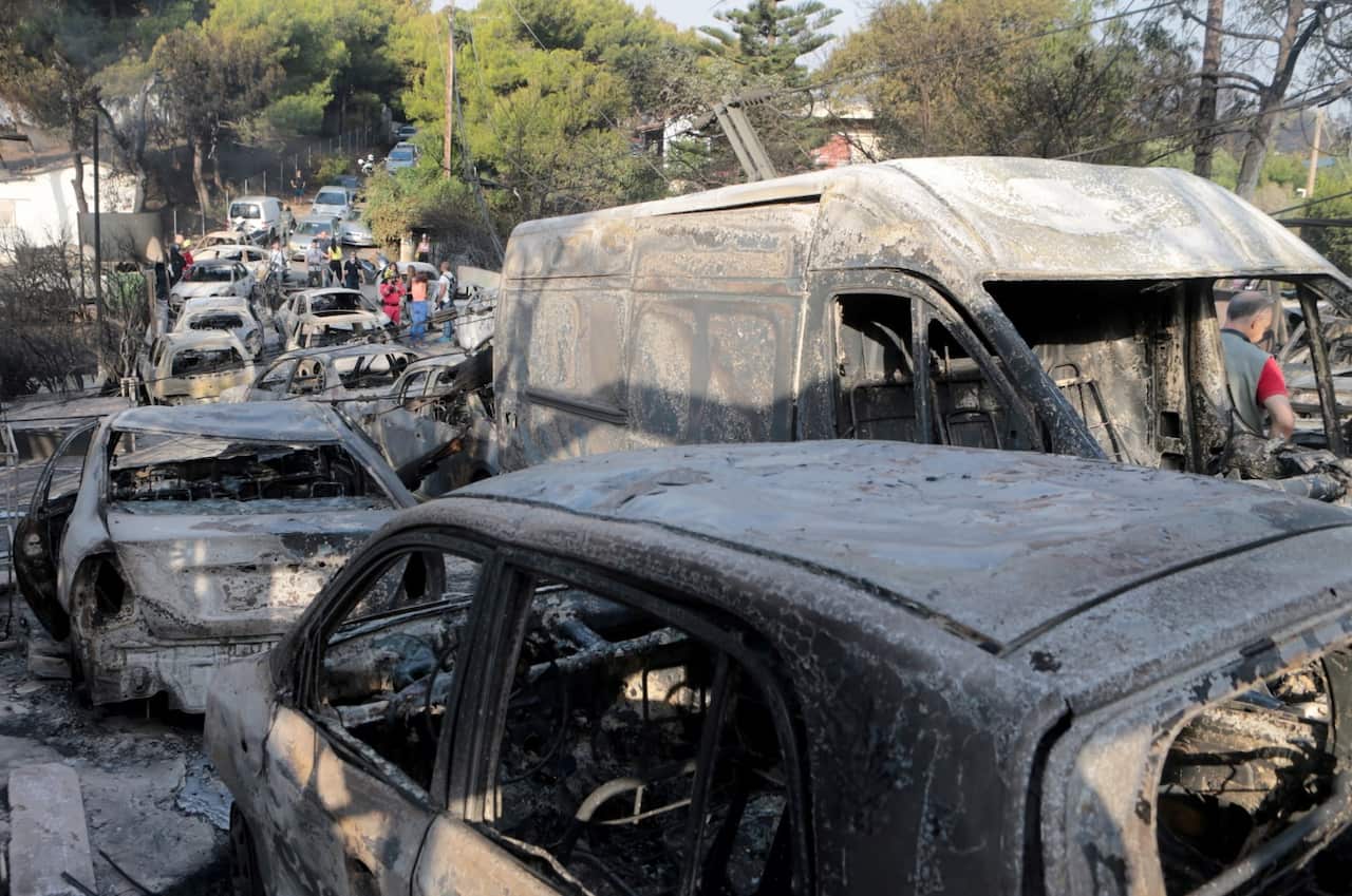 A view of burned cars after a fire in Argyra Akti, Mati, close to Nea Makri, in Attica, Greece, 24 July 2018.