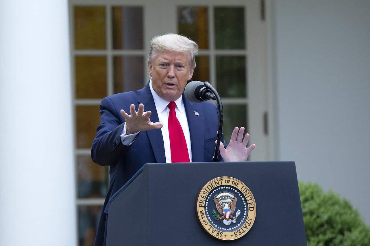 President Donald Trump delivers remarks at a news conference in the White House Rose Garden