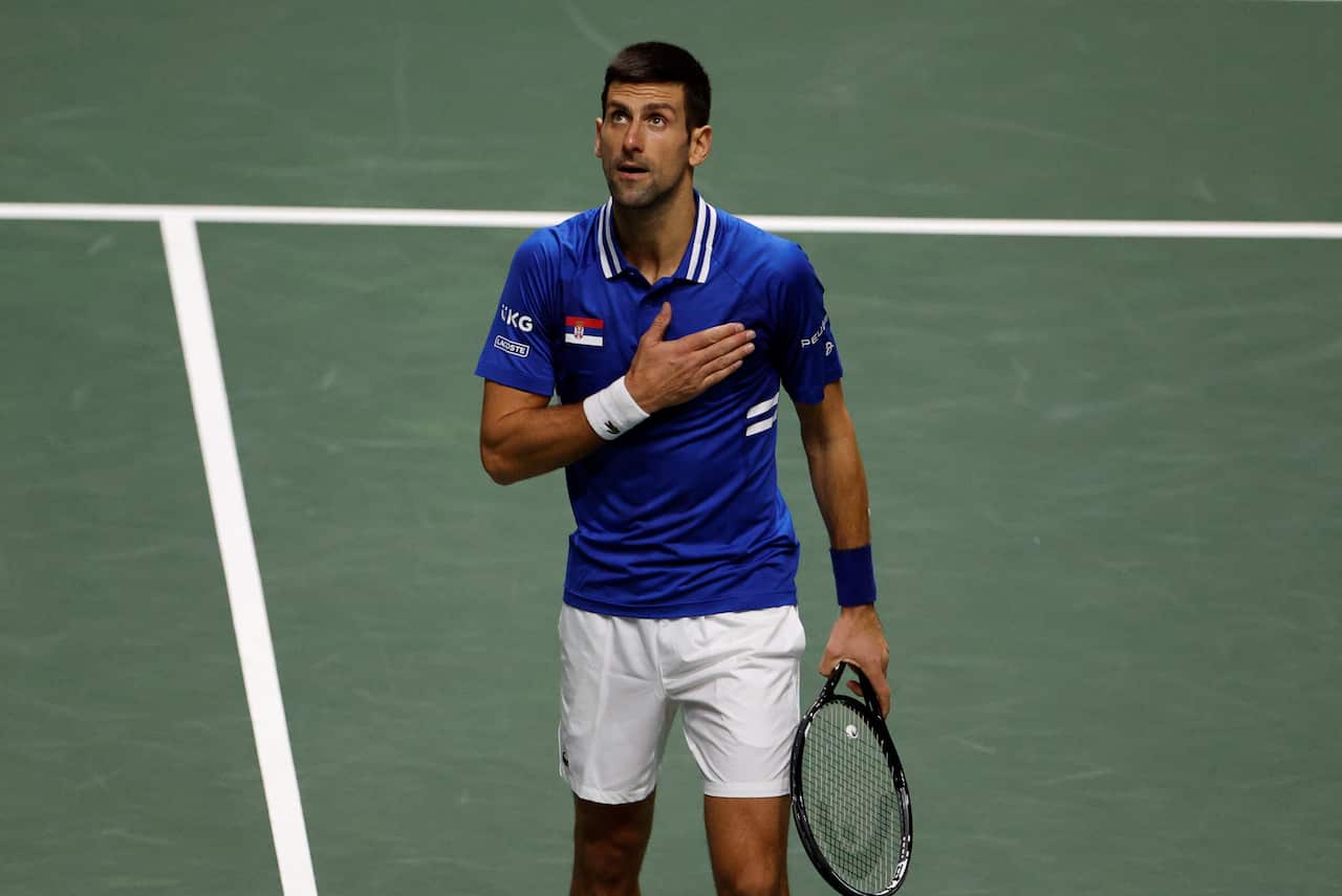 Novak Djokovic of Serbia celebrates a winning point against Marin Cilic of Croatia.