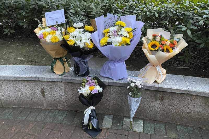 Floral tributes left outside Wuhan Central Hospital on Saturday, Feb. 6, 2021