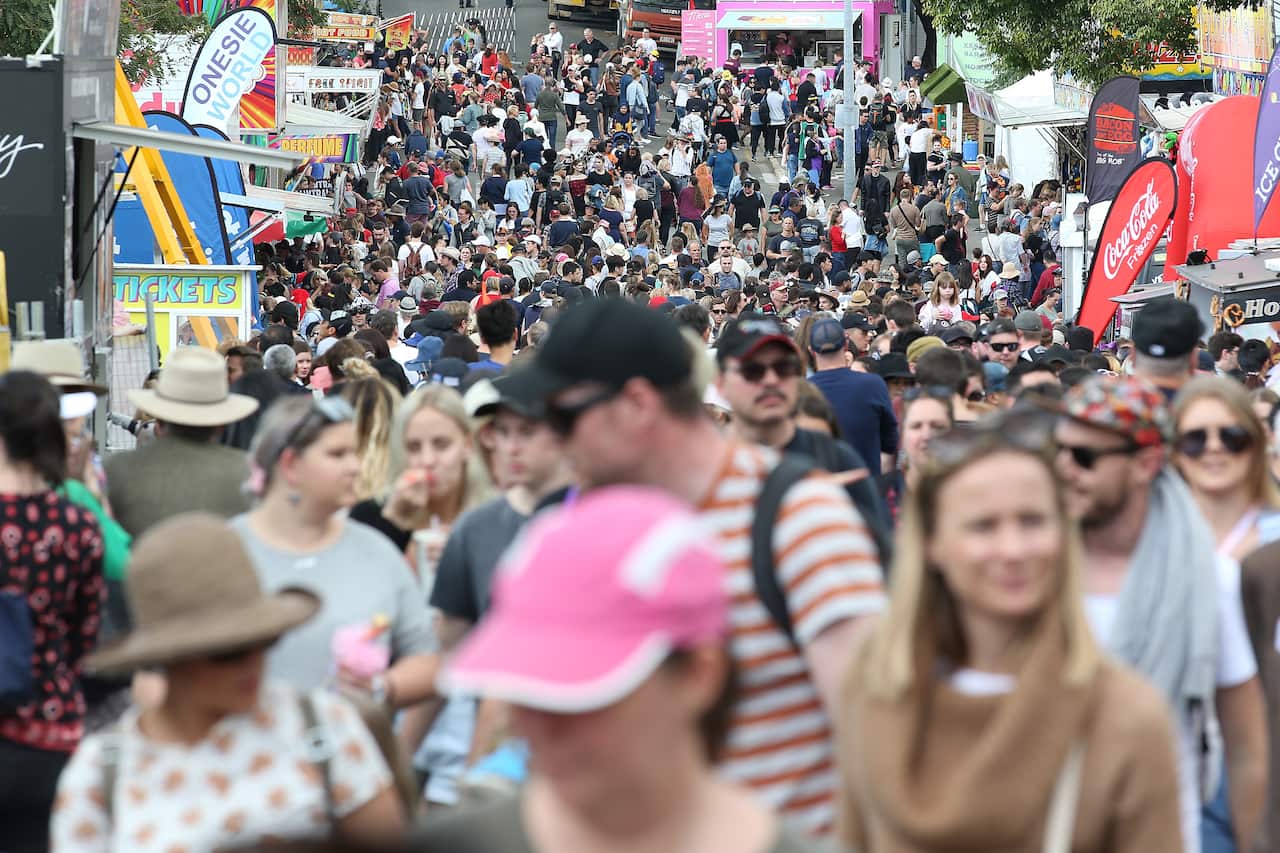 Crowds are seen at the Brisbane Royal Exhibition show, locally known as the Ekka, in Brisbane, Wednesday, August 14, 2019. (AAP Image/Jono Searle) NO ARCHIVING