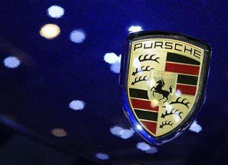 A Porsche logo is pictured on the Cayenne Diesel during the second media day of the 79th Geneva Car Show
