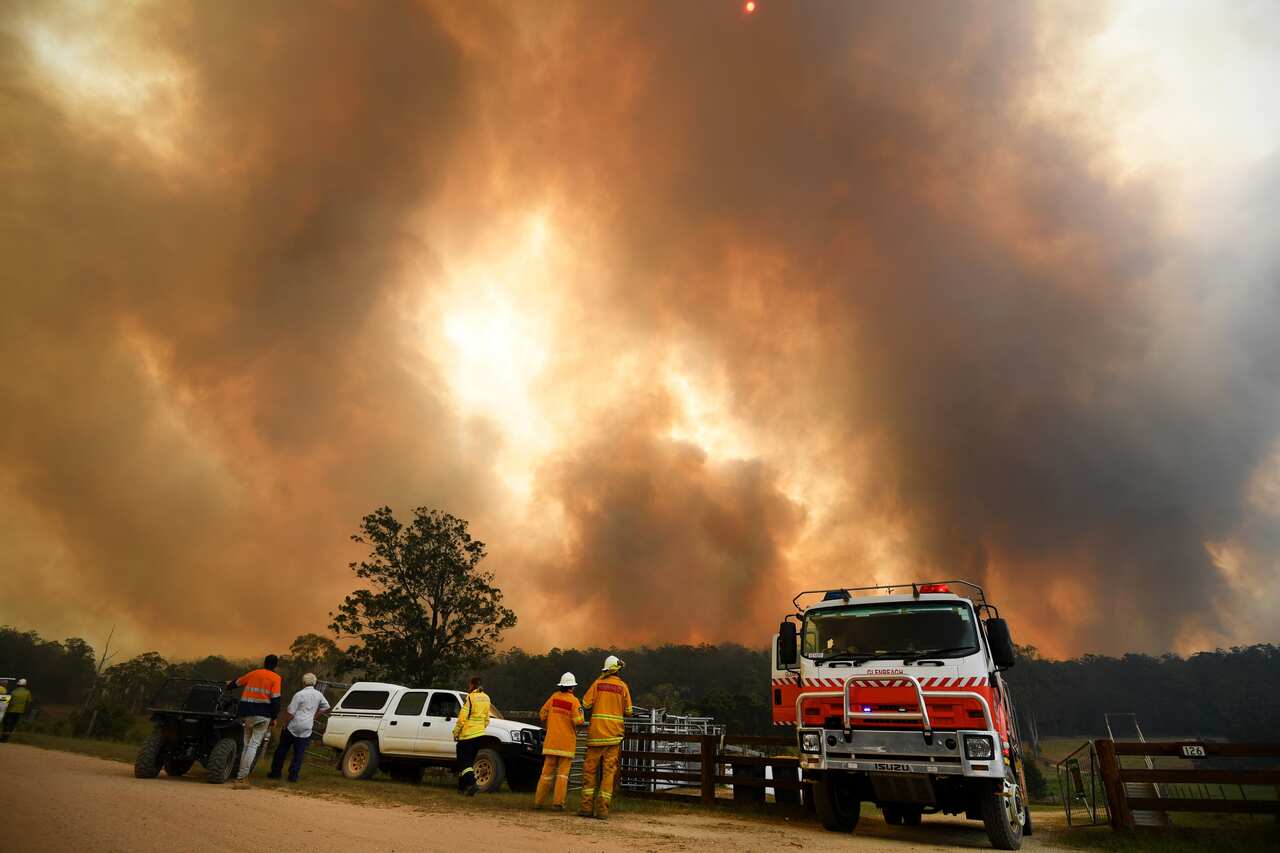 Smoke from a large bushfire is seen outside Nana Glen, near Coffs Harbour.