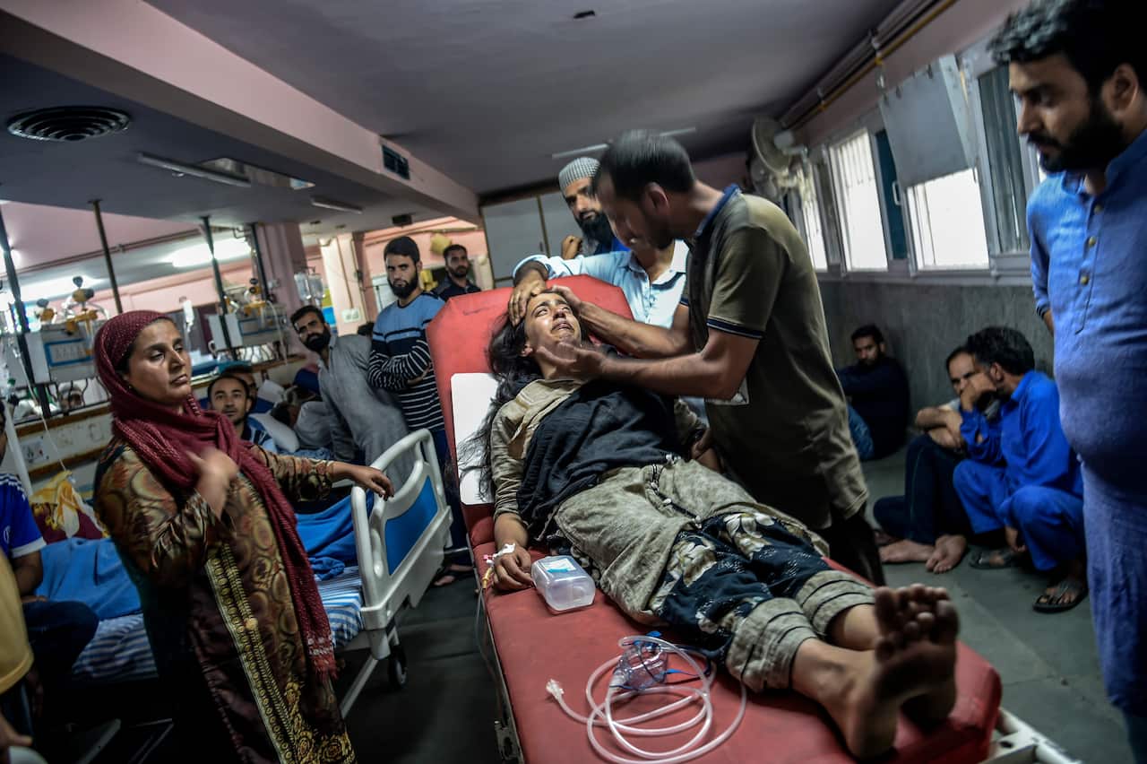 Afshana Farooq, a 14-year-old who was nearly trampled in a stampede when Indian forces opened fire on demonstrators, in a hospital in Srinagar, India, Aug. 9, 2019. (Atul Loke/The New York Times)