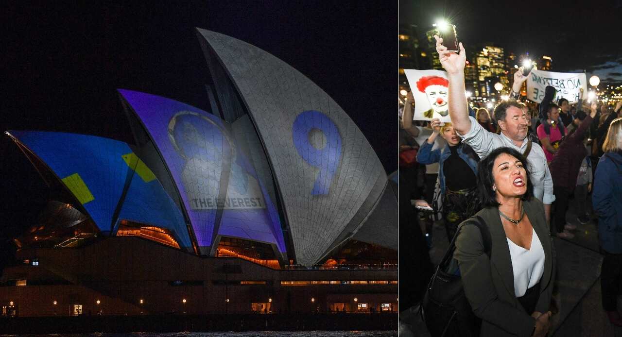 Demonstrators are seen protesting against the promotion at the Opera House