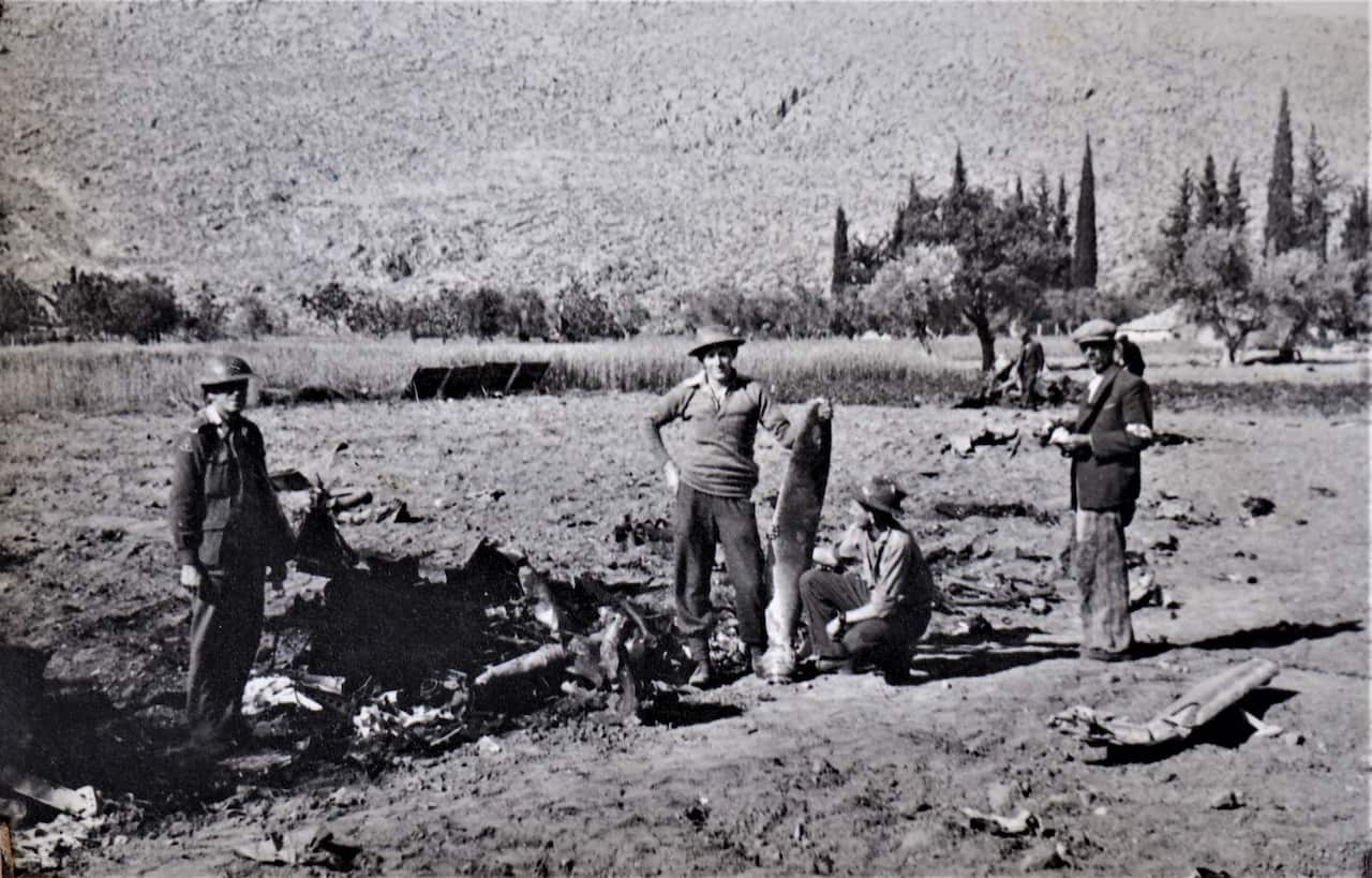 “Greece – Wreckage.” Remains of downed German plane at Nafplio, April 1941.