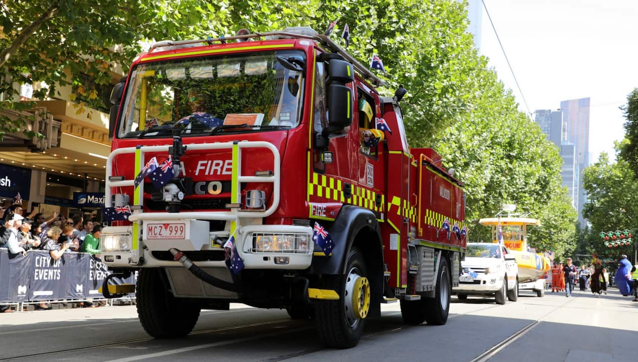 A Country Fire Authority truck from Mallacoota leads the pack in Melbourne.