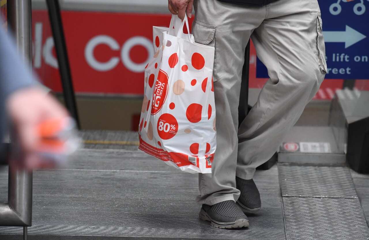 A shopper is seen carrying a reusable plastic bag at a Coles Sydney CBD store, Sydney, Monday, July 2, 2018.