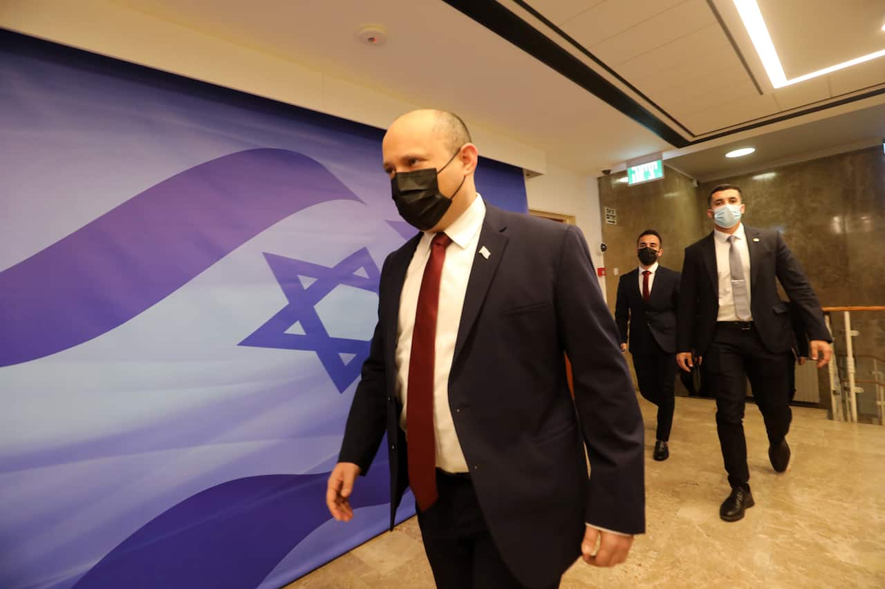 Israeli Prime Minister Naftali Bennet arrives at his office.