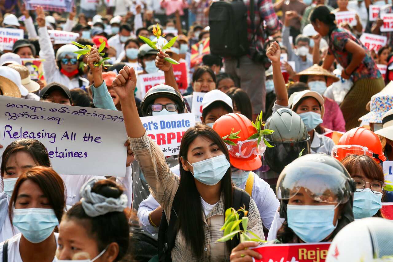 Demonstrators shout slogans during a protest against the Myanmar military coup in Mandalay on 1 April.