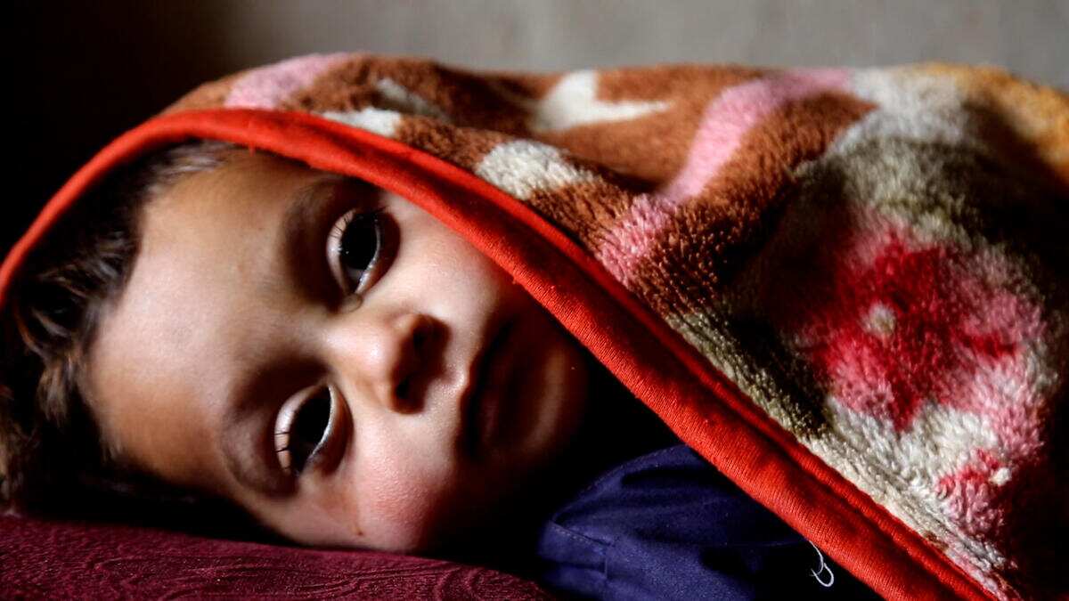 Ara's twin brother Milad. He has been unwell but his mother can't afford to take him to hospital. 