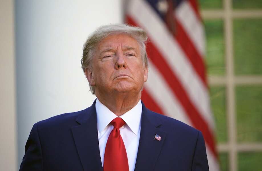 Donald Trump talks to reporters.