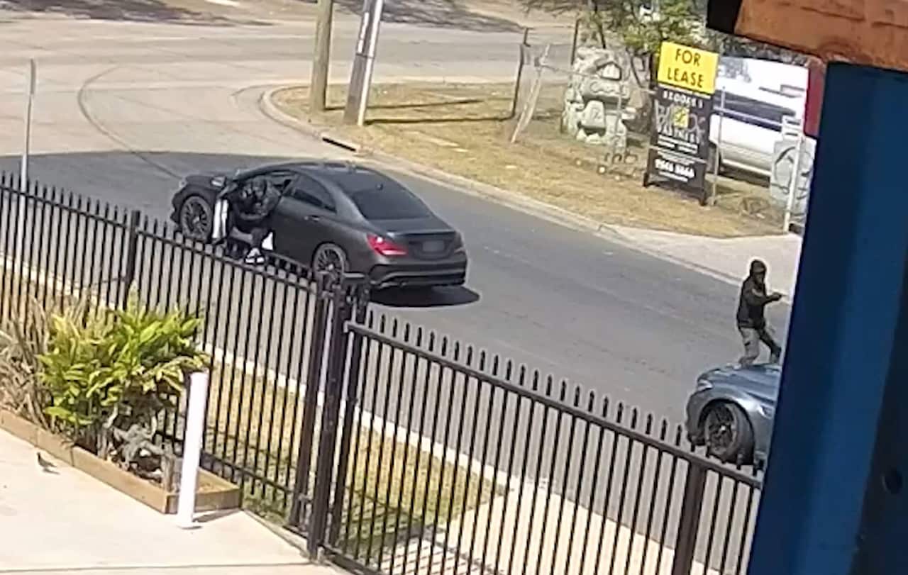 Suspects shooting at a silver AMG Mercedes in Revesby