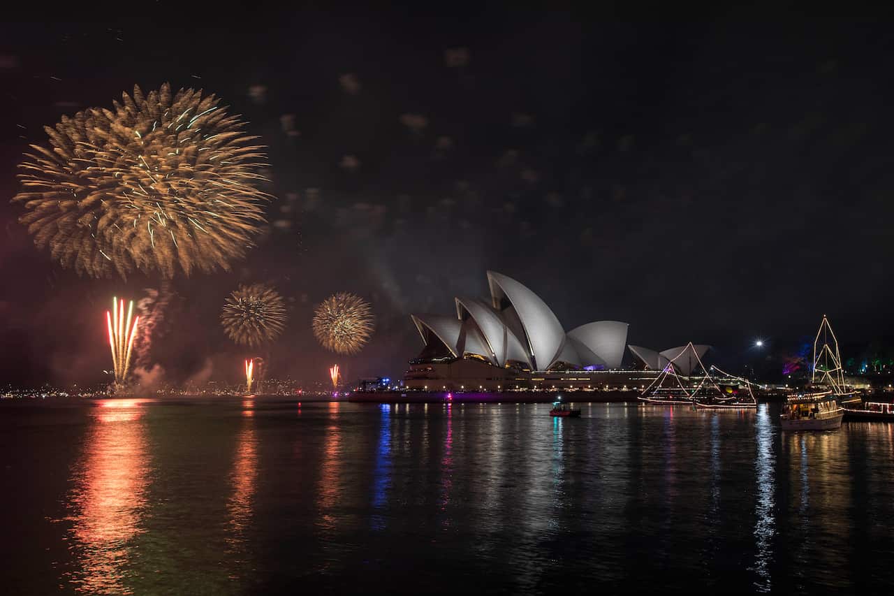 The midnight fireworks light up the Sydney Opera House during New Year's Eve celebrations.