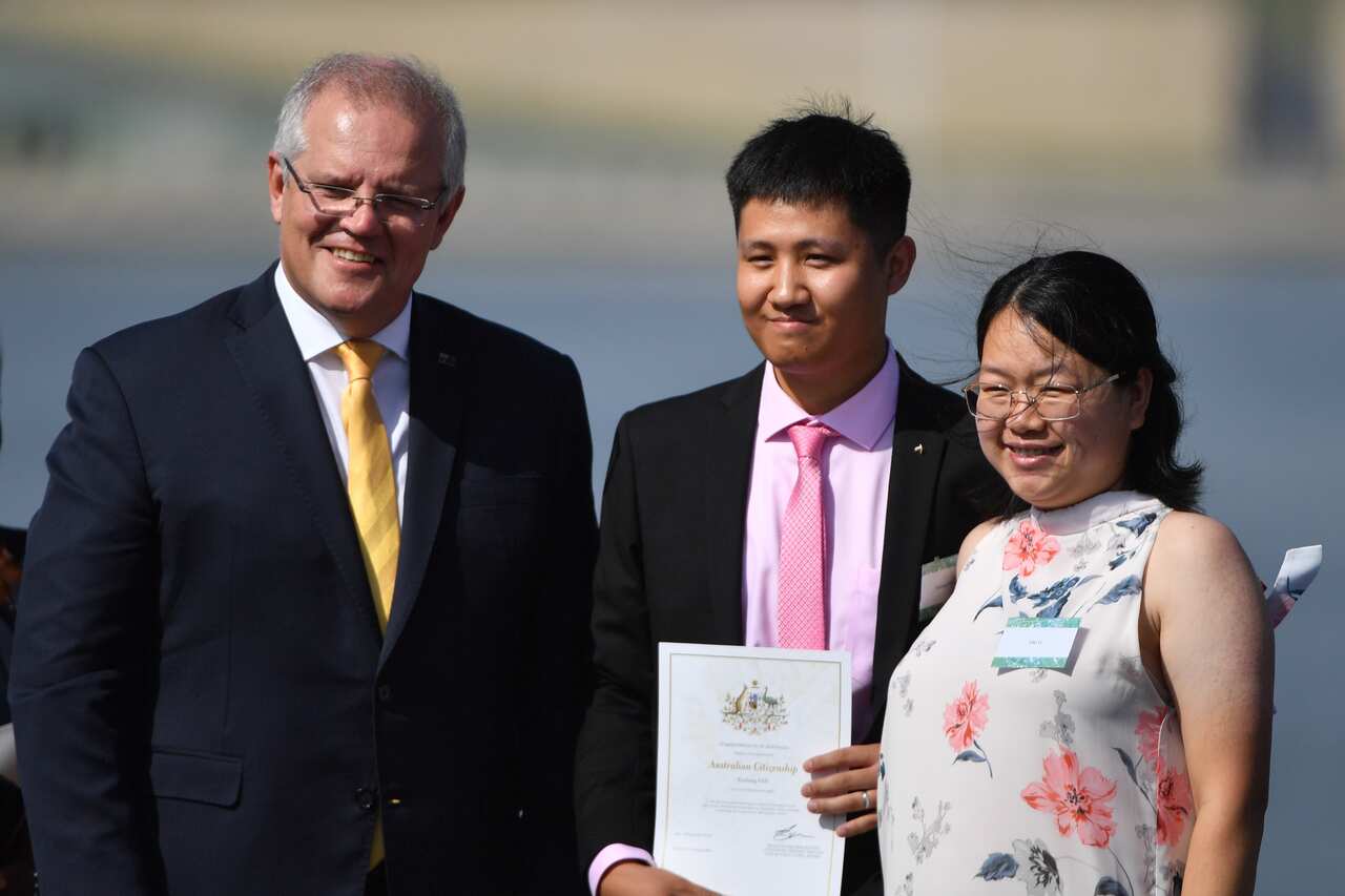 Scott Morrison gives out citizenship certificates 