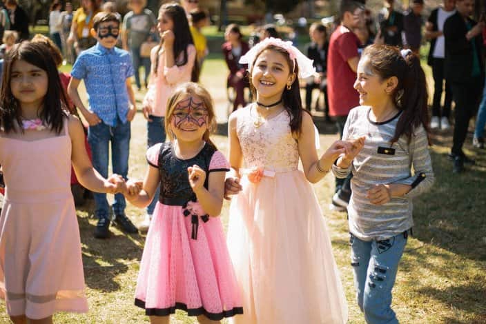 Refugee children at You Belong picnic