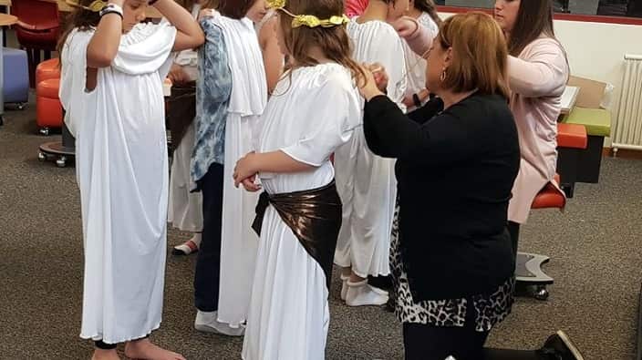 At the play rehearsal. 