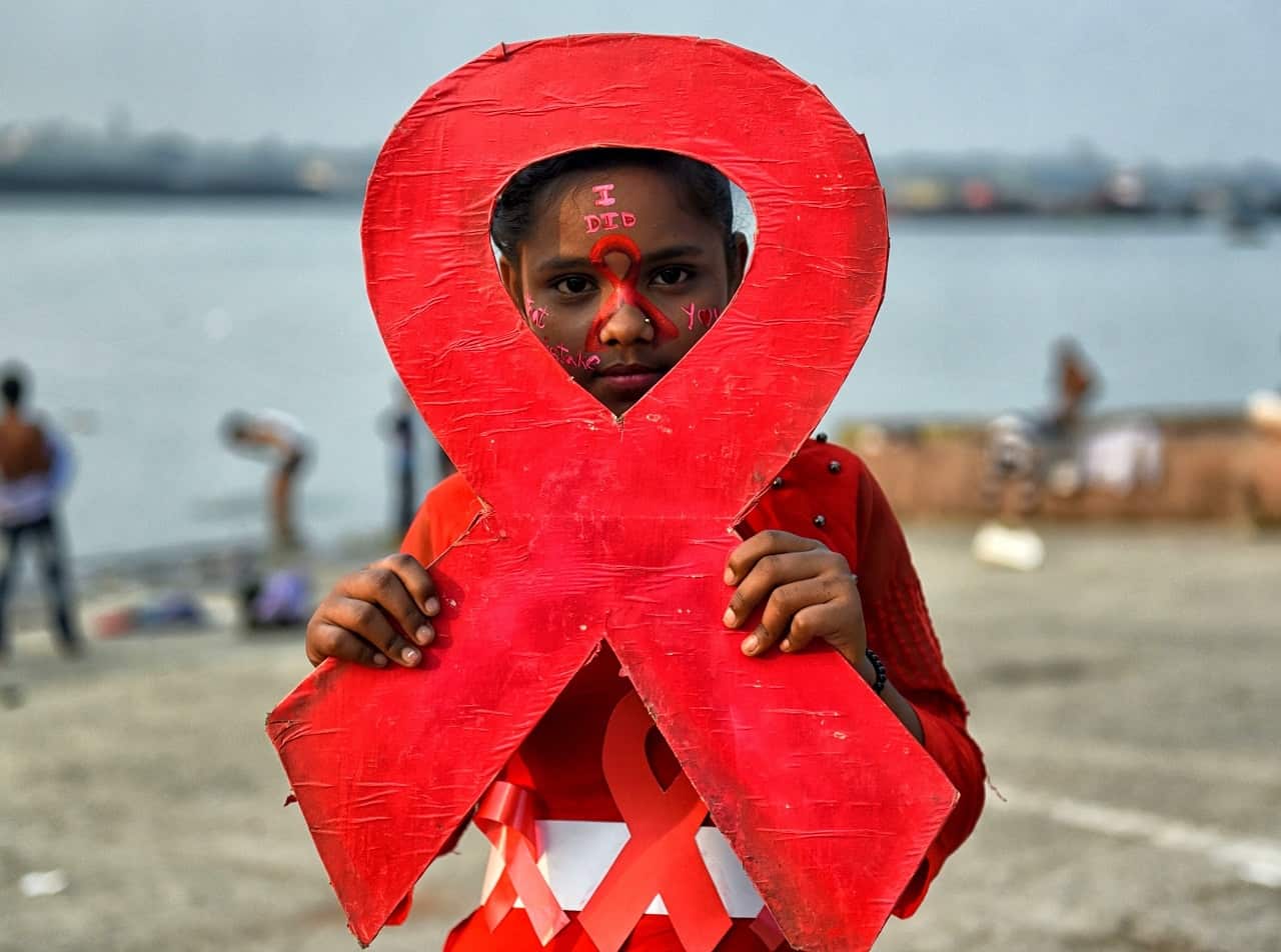 A young girl in India marks World AIDS Day.