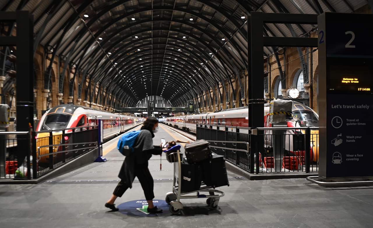 A commuter at Kings Cross train station in London, Britain.