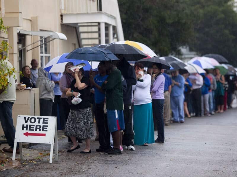 Lines of voters wait in the rain to cast their vote in St Petersburg, Florida. The swing state of Florida is recognised to be a hotly contested battleground that offers 29 electoral votes. (Getty)