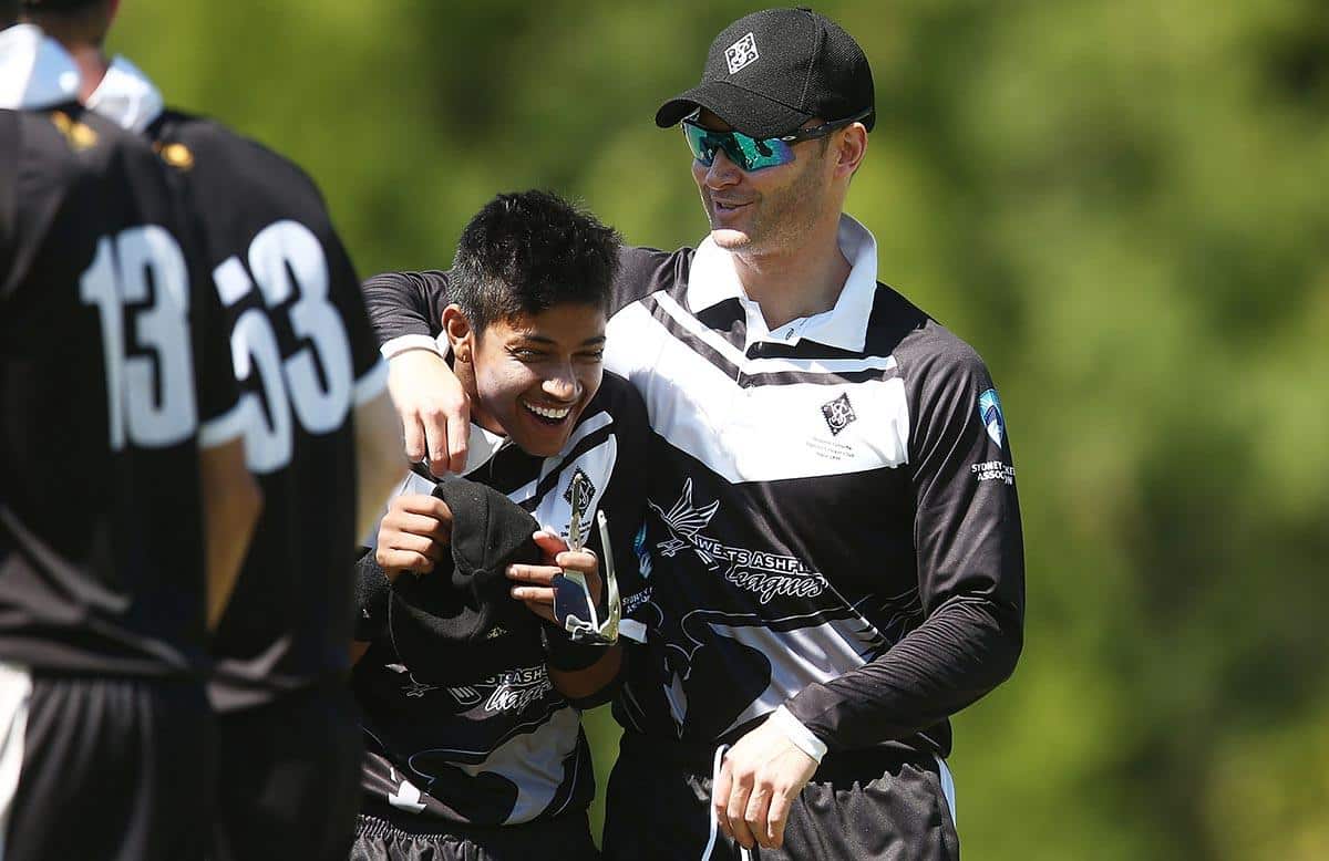 Sandeep Lamichhane with Western Suburb captain Michael Clarke