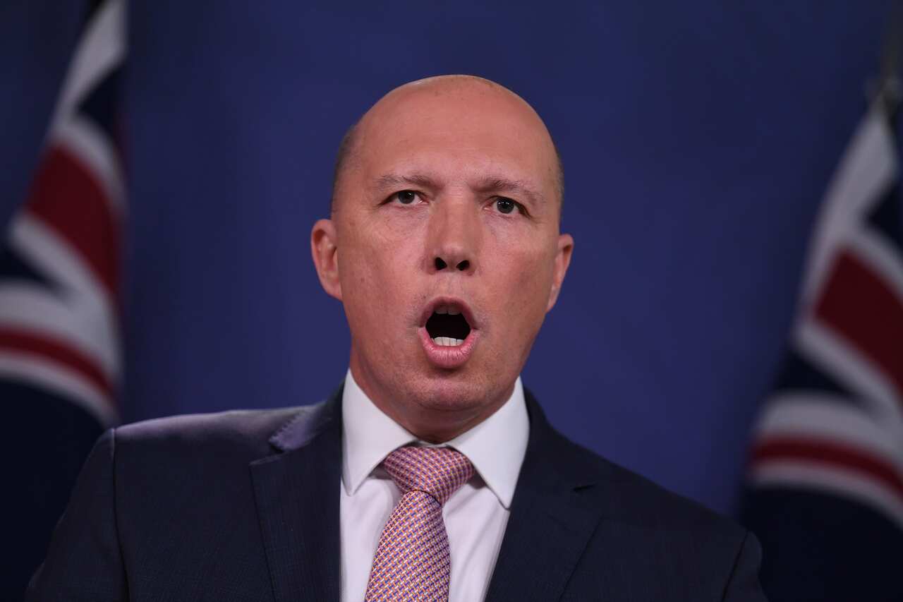 Federal Minister for Home Affairs Peter Dutton speaks to the media during a press conference at the Commonwealth Parliamentary offices in Sydney, Tuesday, November 20, 2018. (AAP Image/Dean Lewins) NO ARCHIVING