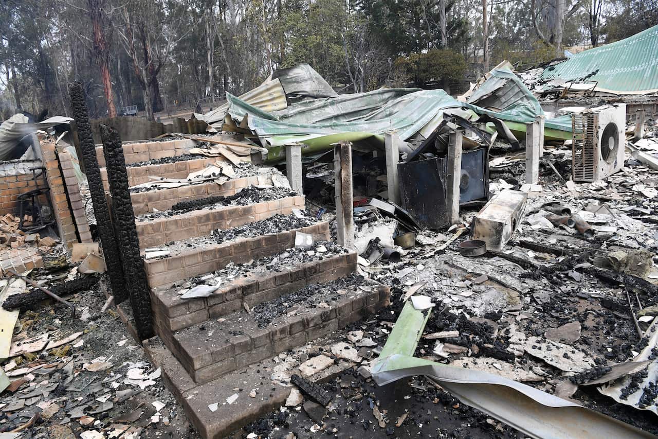A burnt-out residence is seen in Sarsfield, East Gippsland, Victoria.
