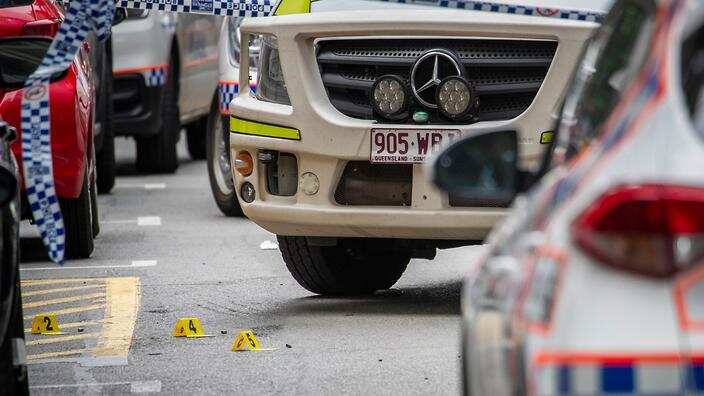 The forensic scene where police shot and killed a man outside the Westin Hotel on Mary Street in central Brisbane.