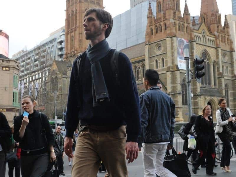 A file image of people walking on Flinders Street, Melbourne.