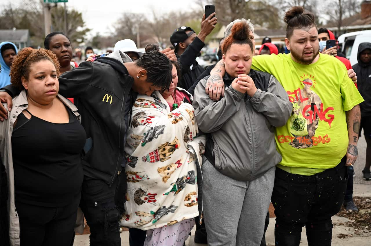 Family and friends of Daunte Wright hours after they say he was shot and killed by police Wright's mother, Katie Wright, stands at center.