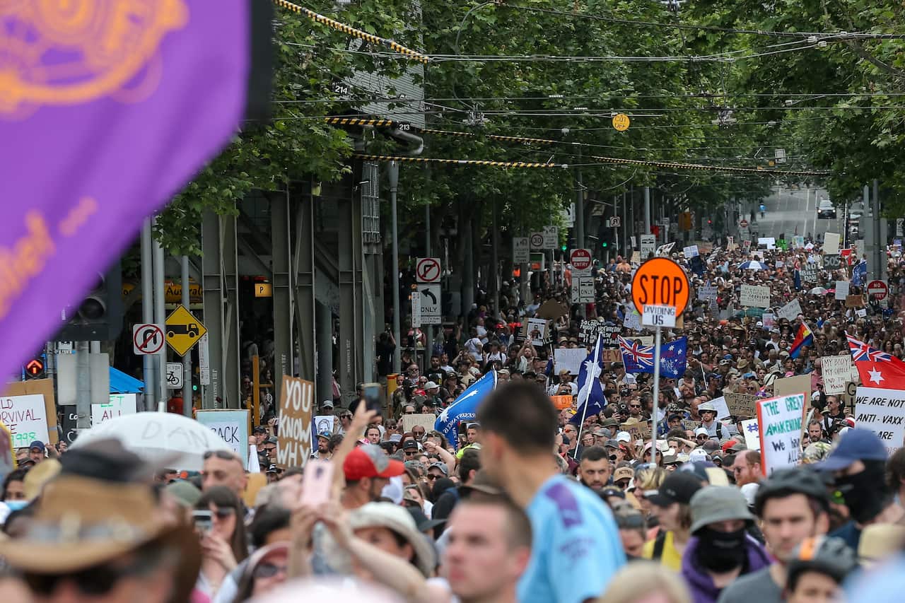 Protesters are seen during a rally against the state government's proposed pandemic laws, in Melbourne, Saturday, November 6, 2021. 